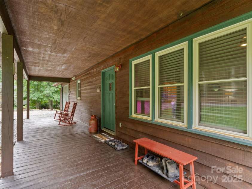 47 Old Chimney Drive, Burnsville, NC 28714.  MLS# CAR4269340, YatesRealty ID 23334. Front porch opposite view
