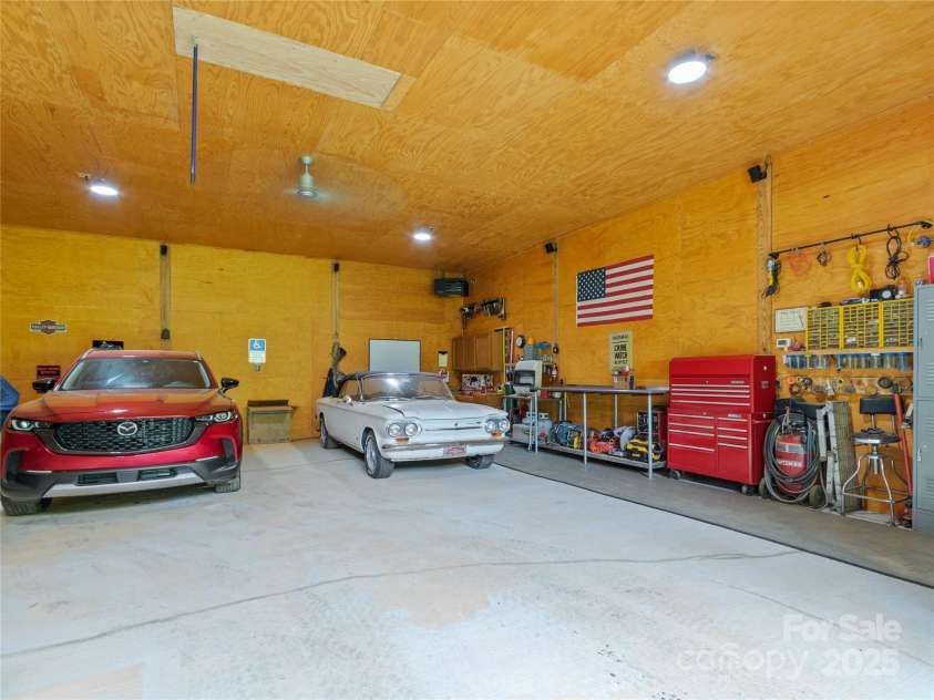 47 Old Chimney Drive, Burnsville, NC 28714.  MLS# CAR4269340, YatesRealty ID 23334. Fully insulated workshop
