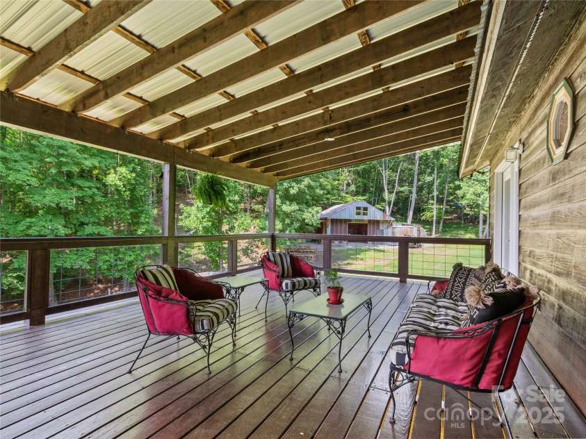 47 Old Chimney Drive, Burnsville, NC 28714.  MLS# CAR4269340, YatesRealty ID 23334. Looking right from the door