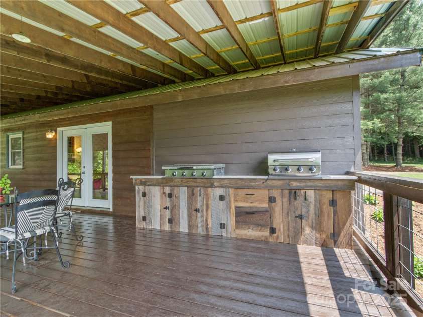 47 Old Chimney Drive, Burnsville, NC 28714.  MLS# CAR4269340, YatesRealty ID 23334. Outdoor kitchen