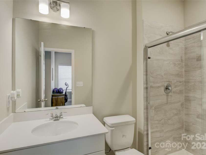 9507 Pointer Road, Huntersville, NC 28078.  MLS# CAR4276054, YatesRealty ID 23336. En-suite bathroom with Bedroom 4