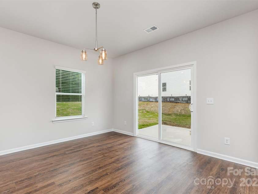 2055 Sadler Woods Lane, Charlotte, NC 28214.  MLS# CAR4265583, YatesRealty ID 23337. Dining. Representational Photo.
