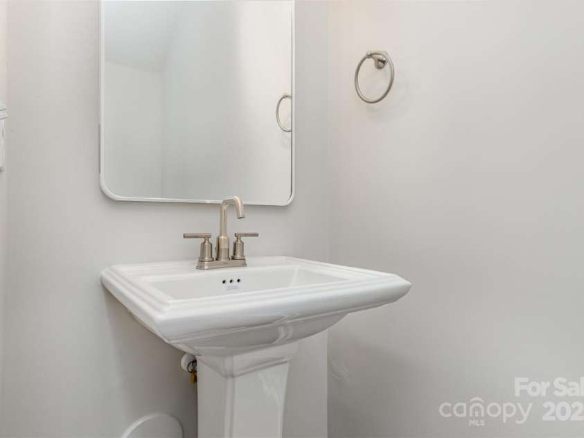 2055 Sadler Woods Lane, Charlotte, NC 28214.  MLS# CAR4265583, YatesRealty ID 23337. Half bathroom. Representational Photo.