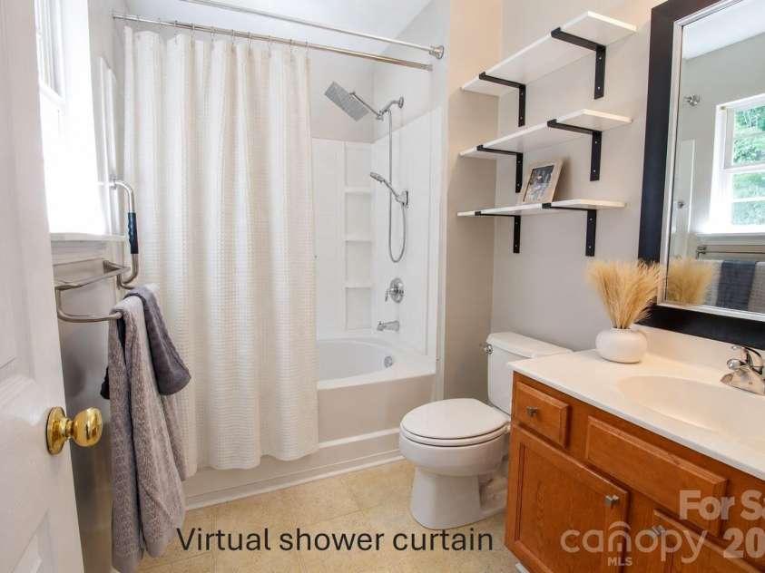 407 Delta Drive, Fort Mill, SC 29715.  MLS# CAR4365600, YatesRealty ID 23339. Primary bath virtual