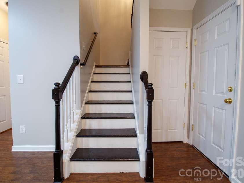 407 Delta Drive, Fort Mill, SC 29715.  MLS# CAR4365600, YatesRealty ID 23339. Stairs to upper level
