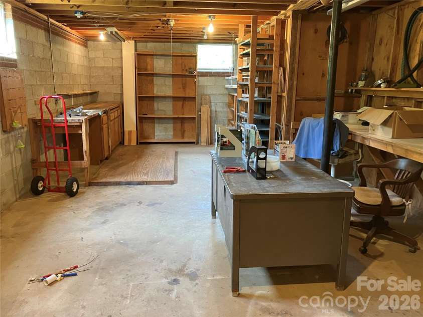 151 Lincoln Road, Forest City, NC 28043.  MLS# CAR4372275, YatesRealty ID 23341. Basement workshop area