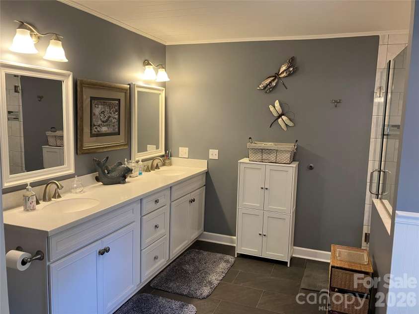 151 Lincoln Road, Forest City, NC 28043.  MLS# CAR4372275, YatesRealty ID 23341. Primary bathroom