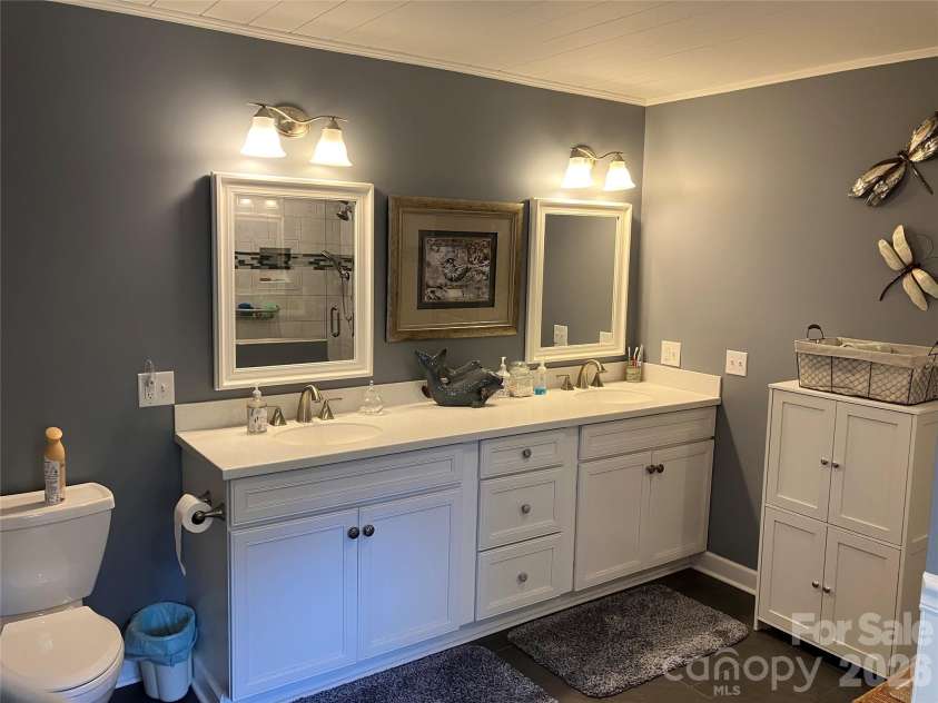 151 Lincoln Road, Forest City, NC 28043.  MLS# CAR4372275, YatesRealty ID 23341. Primary bathroom sinks