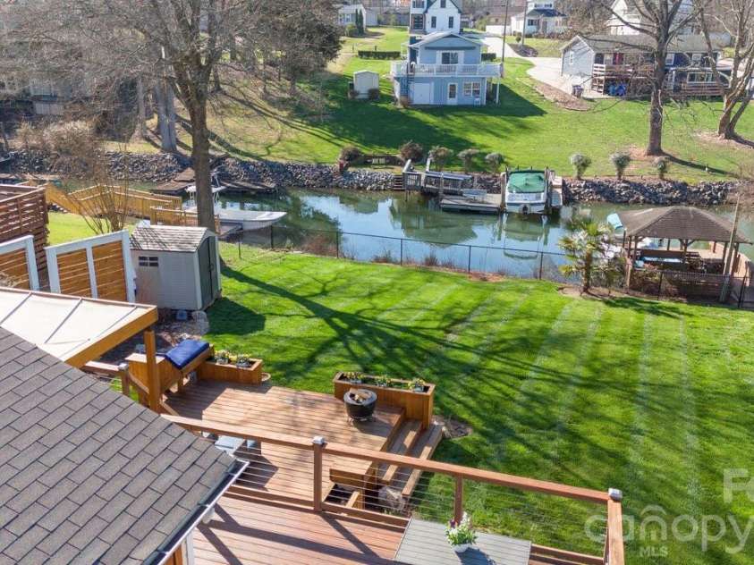 141 Bluewing Lane, Mooresville, NC 28117.  MLS# CAR4381743, YatesRealty ID 23352. Backyard paradise
