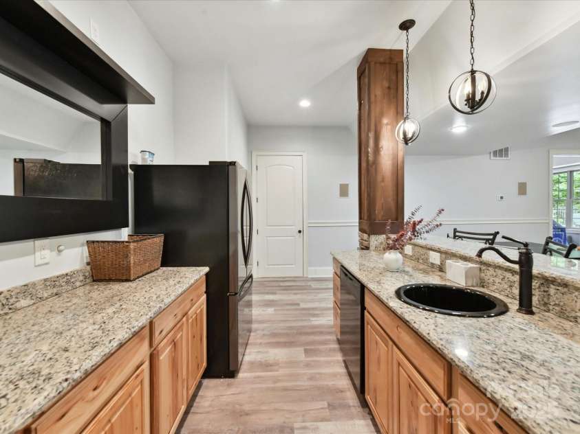 633 Elmhurst Drive, Fort Mill, SC 29715.  MLS# CAR4245784, YatesRealty ID 23352. Basement Kitchen