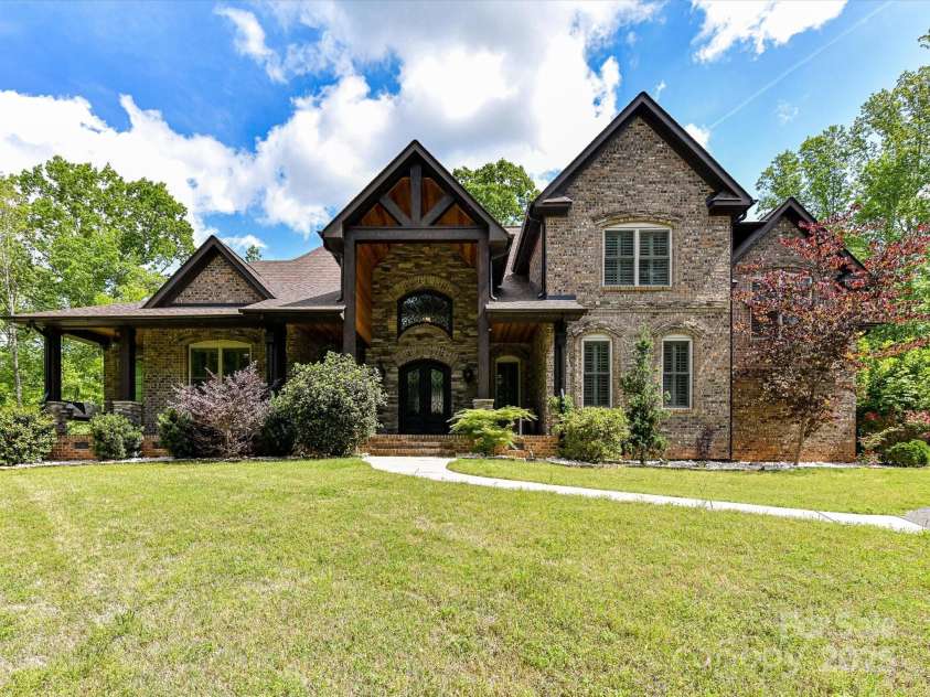 633 Elmhurst Drive, Fort Mill, SC 29715.  MLS# CAR4245784, YatesRealty ID 23352. Gorgeous 4bdm, 4.5 bath brick home located on a sprawling 6.5 acres!