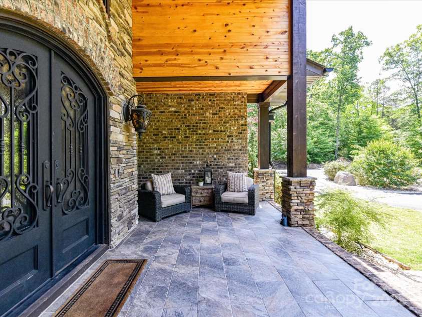 633 Elmhurst Drive, Fort Mill, SC 29715.  MLS# CAR4245784, YatesRealty ID 23352. Sophisticated and Welcoming Entryway with Stone and brick exterior siding and brank new cedar soffit