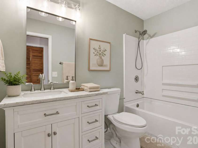207 Wood Dale Drive, Hendersonville, NC 28791.  MLS# CAR4382513, YatesRealty ID 23356. Virtually staged