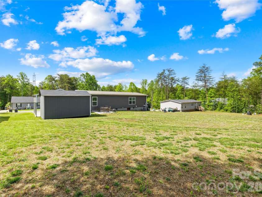 171 Brook Creek Drive, Troutman, NC 28166.  MLS# CAR4381849, YatesRealty ID 23361. Spacious back yard!