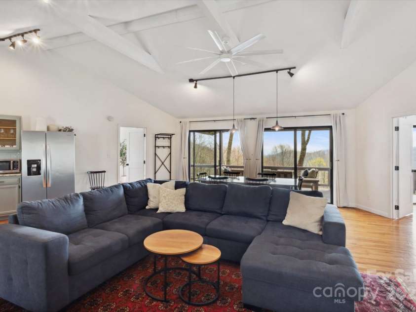 423 Grouse Thicket Road, Mars Hill, NC 28754.  MLS# CAR4220516, YatesRealty ID 23361. Open floor plan + vaulted ceilings + stone fireplace