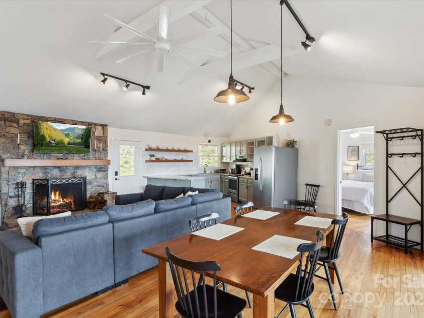 423 Grouse Thicket Road, Mars Hill, NC 28754.  MLS# CAR4220516, YatesRealty ID 23361. Open floor plan + vaulted ceilings + stone fireplace