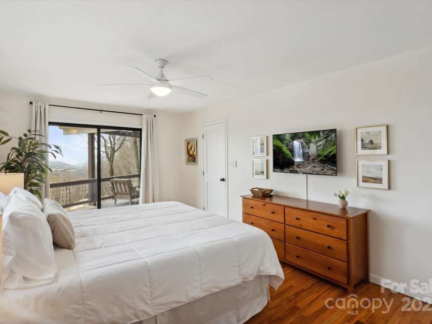 423 Grouse Thicket Road, Mars Hill, NC 28754.  MLS# CAR4220516, YatesRealty ID 23361. Primary Bedroom w/ ensuite bathroom