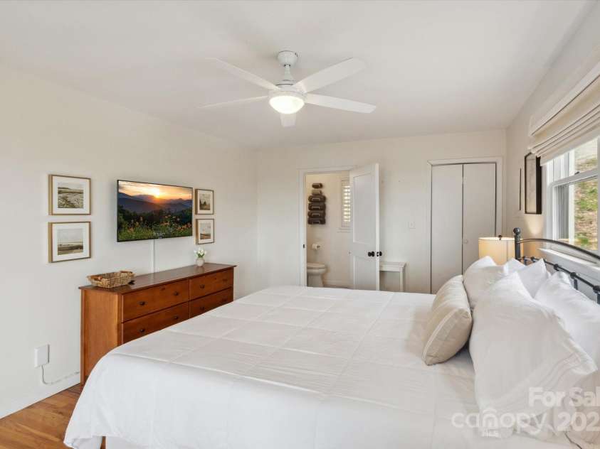 423 Grouse Thicket Road, Mars Hill, NC 28754.  MLS# CAR4220516, YatesRealty ID 23361. Primary Bedroom w/ ensuite bathroom