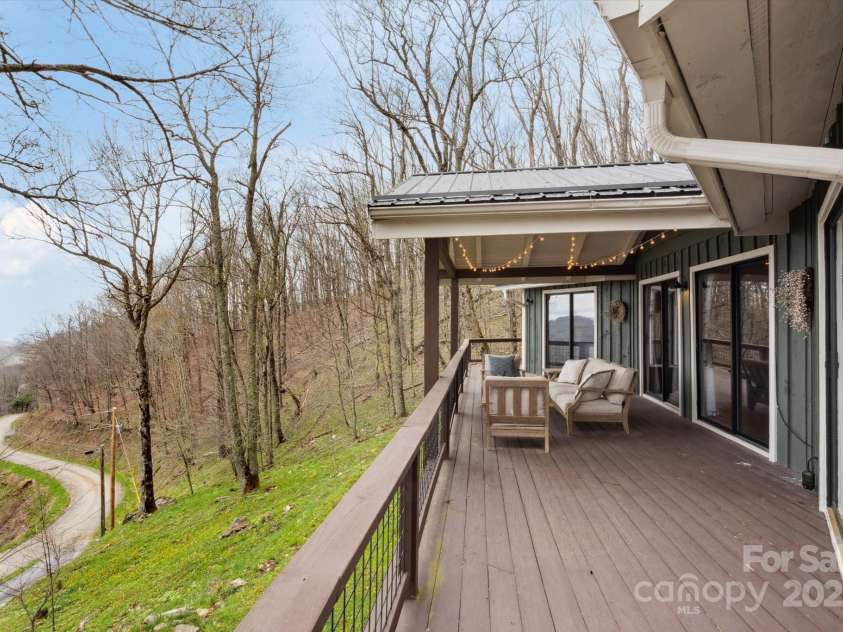 423 Grouse Thicket Road, Mars Hill, NC 28754.  MLS# CAR4220516, YatesRealty ID 23361. Wrap-around deck