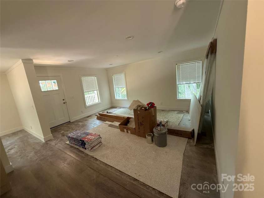 55 Cypress Road, Marion, NC 28752.  MLS# CAR4261438, YatesRealty ID 23362. Open Living Room (home will be cleaned when completed)
