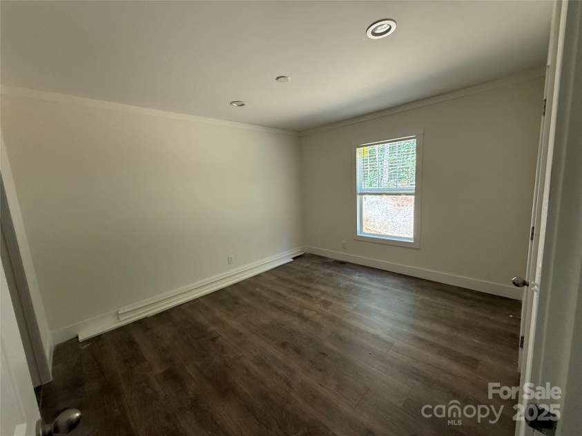 55 Cypress Road, Marion, NC 28752.  MLS# CAR4261438, YatesRealty ID 23362. Primary Bedroom