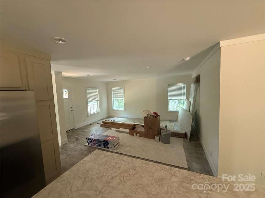 55 Cypress Road, Marion, NC 28752.  MLS# CAR4261438, YatesRealty ID 23362. View of living room from kitchen