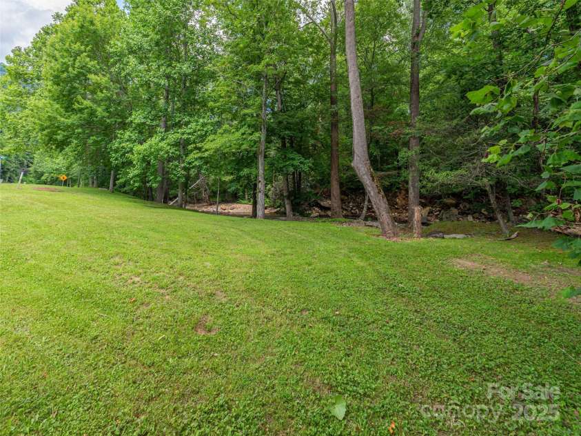 15 Breezy Creek Lane, Maggie Valley, NC 28751.  MLS# CAR4279649, YatesRealty ID 2337. Adjoining parcel available for addl 85k