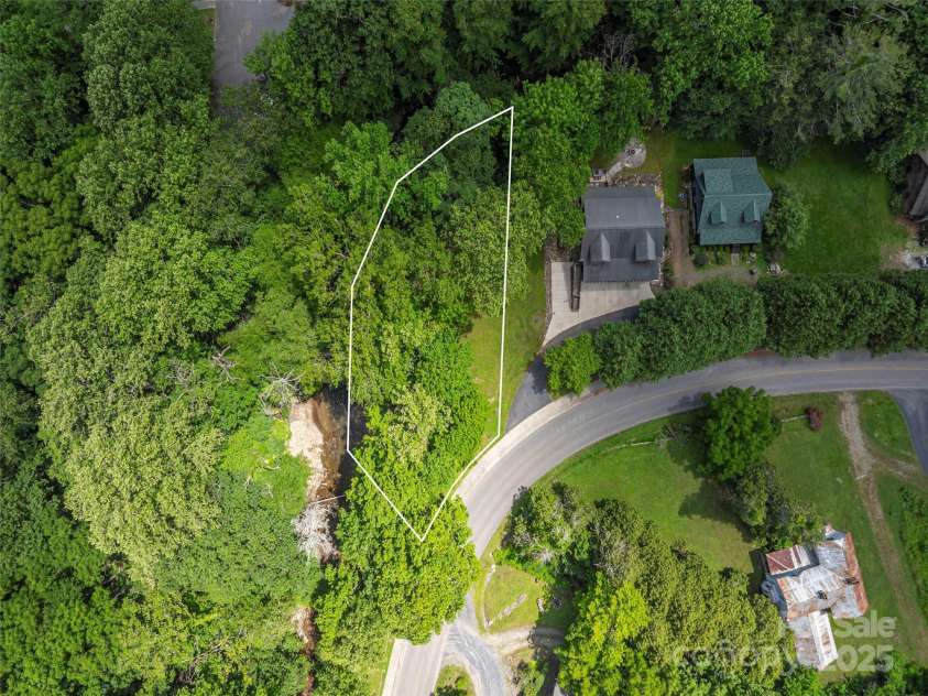 15 Breezy Creek Lane, Maggie Valley, NC 28751.  MLS# CAR4279649, YatesRealty ID 2337. Adjoining parcel available for addl 85k