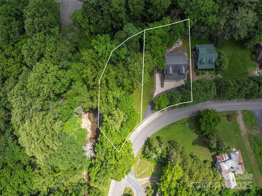 15 Breezy Creek Lane, Maggie Valley, NC 28751.  MLS# CAR4279649, YatesRealty ID 2337. Adjoining parcel available for addl 85k