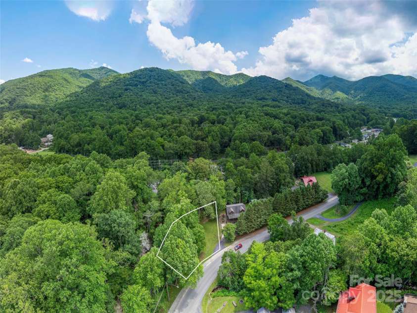15 Breezy Creek Lane, Maggie Valley, NC 28751.  MLS# CAR4279649, YatesRealty ID 2337. Adjoining parcel available for addl 85k