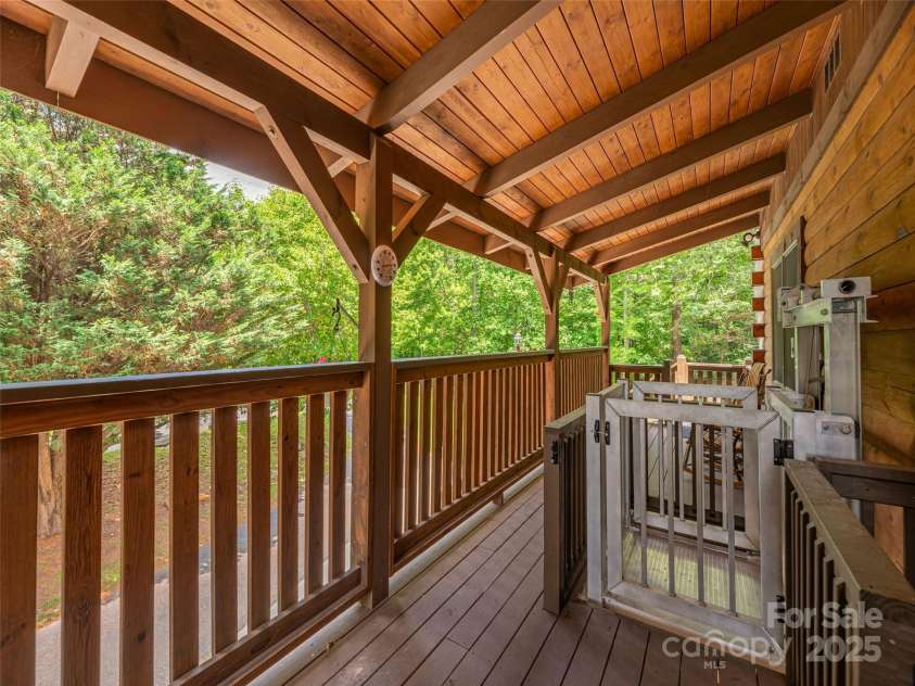 15 Breezy Creek Lane, Maggie Valley, NC 28751.  MLS# CAR4279649, YatesRealty ID 2337. Exterior elevator