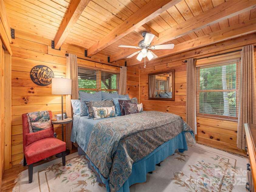 15 Breezy Creek Lane, Maggie Valley, NC 28751.  MLS# CAR4279649, YatesRealty ID 2337. Main level primary bedroom suite