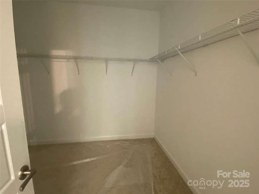 9130 Dulwich Drive, Charlotte, NC 28215.  MLS# CAR4201541, YatesRealty ID 23370. Premier Walk-in Closet