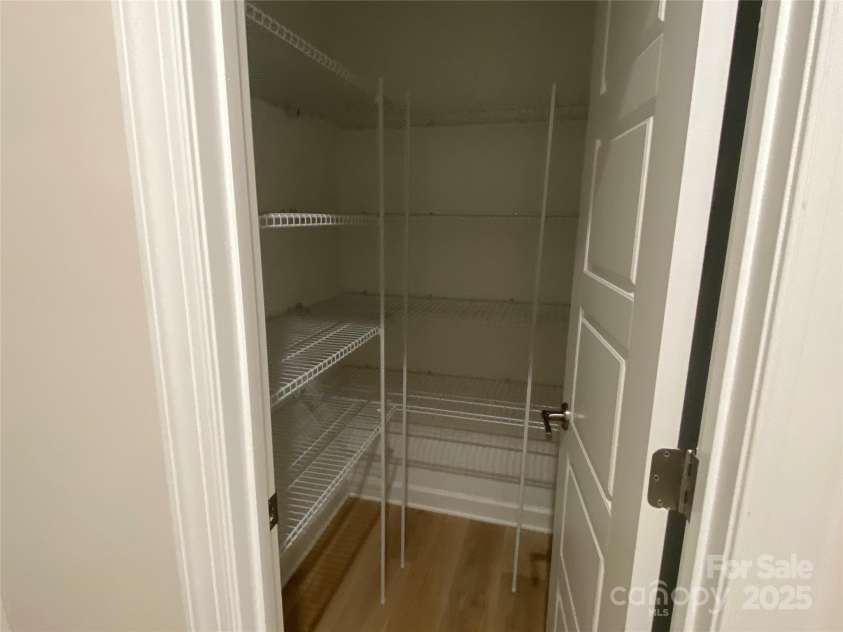 9130 Dulwich Drive, Charlotte, NC 28215.  MLS# CAR4201541, YatesRealty ID 23370. Walk-in Pantry