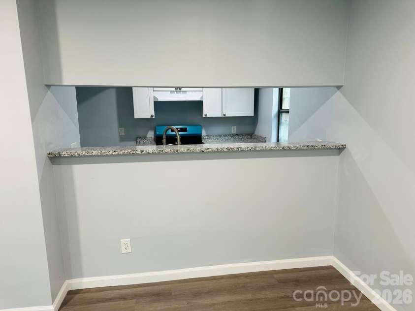 8029 Cedar Glen Drive, Charlotte, NC 28212.  MLS# CAR4382249, YatesRealty ID 23377. View from Living to Kitchen
