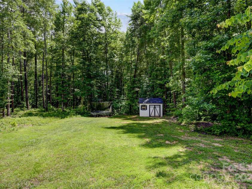 319 San Agustin Drive, Mooresville, NC 28117.  MLS# CAR4263514, YatesRealty ID 23379. HUGE Backyard w/ Room for a Pool!!!