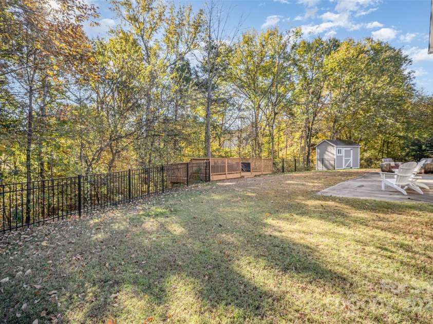 4901 Riverview Drive, Harrisburg, NC 28075.  MLS# CAR4318206, YatesRealty ID 2338. Backyard