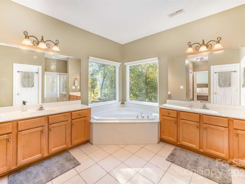 4901 Riverview Drive, Harrisburg, NC 28075.  MLS# CAR4318206, YatesRealty ID 2338. Primary Bathroom