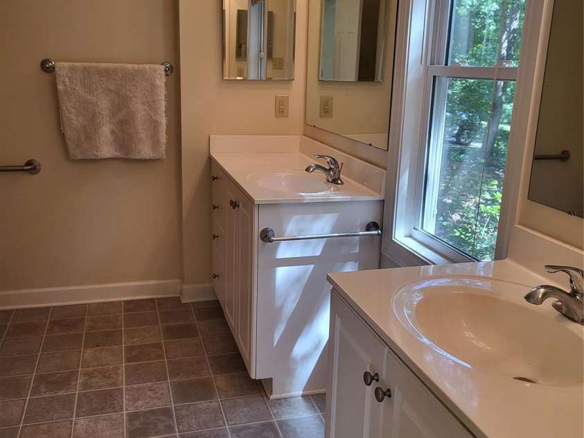 1913 Lake Monroe Drive, Monroe, NC 28212.  MLS# CAR4382343, YatesRealty ID 23380. Bath for Primary bedroom