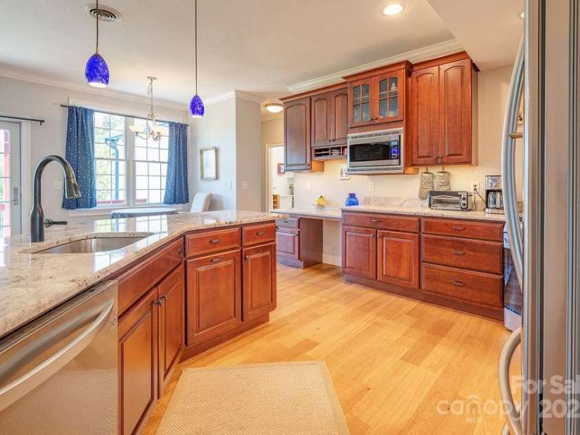 125 Ivy Meadows Drive, Weaverville, NC 28787.  MLS# CAR4247385, YatesRealty ID 23384. Custom cherry cabinets