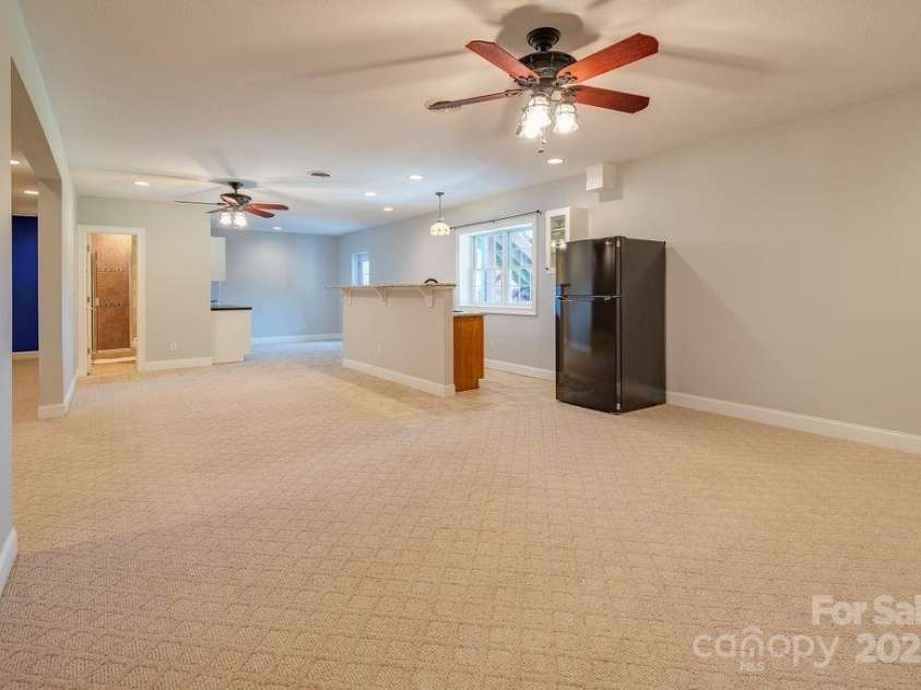 125 Ivy Meadows Drive, Weaverville, NC 28787.  MLS# CAR4247385, YatesRealty ID 23384. Full finished basement