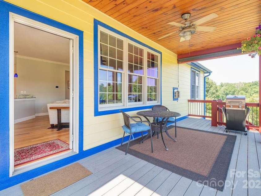 125 Ivy Meadows Drive, Weaverville, NC 28787.  MLS# CAR4247385, YatesRealty ID 23384. Main level back deck