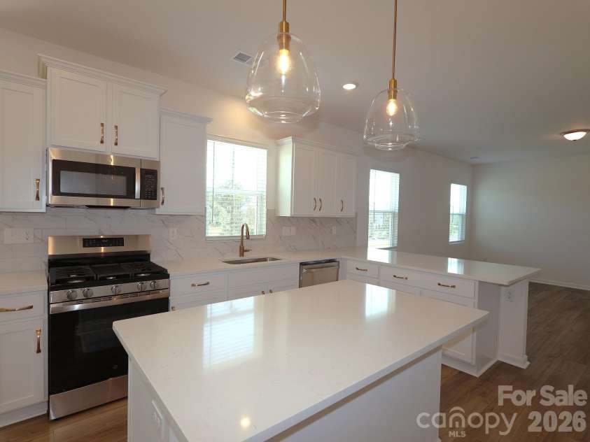 1414 Bucknell Street, Wingate, NC 28174.  MLS# CAR4382345, YatesRealty ID 23386. Kitchen