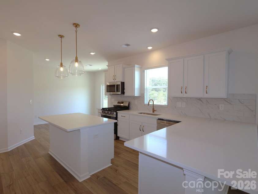 1414 Bucknell Street, Wingate, NC 28174.  MLS# CAR4382345, YatesRealty ID 23386. Kitchen