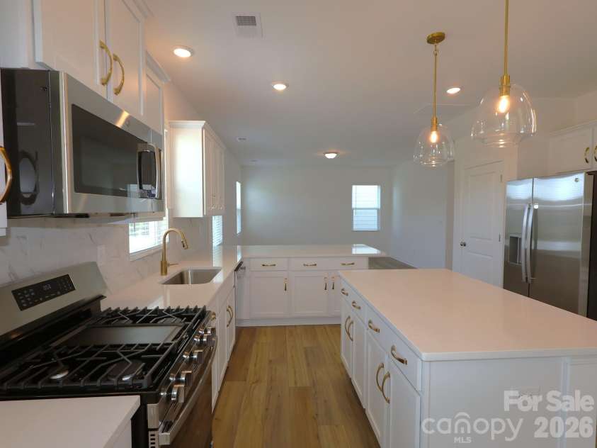 1414 Bucknell Street, Wingate, NC 28174.  MLS# CAR4382345, YatesRealty ID 23386. Kitchen