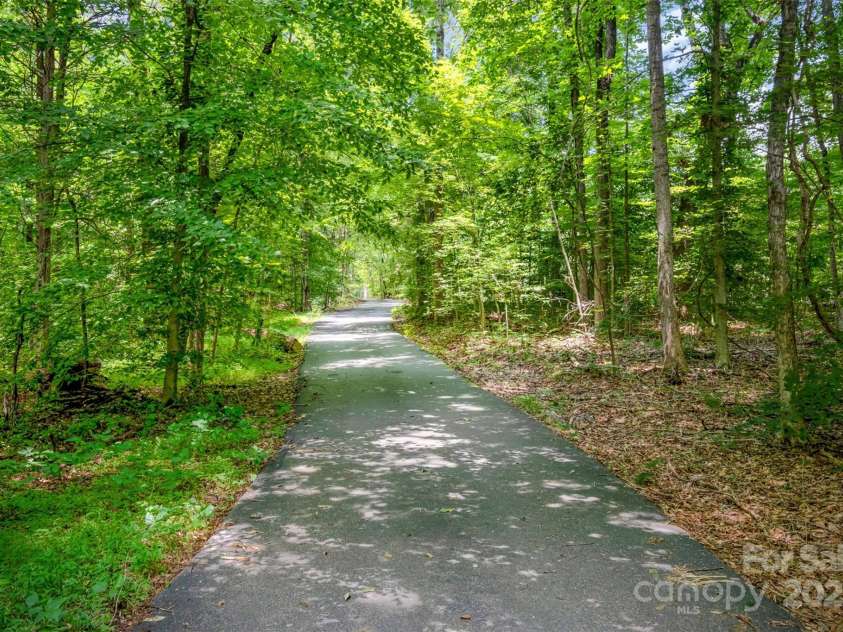 6811 Kluttz Road, Concord, NC 28025.  MLS# CAR4272402, YatesRealty ID 23387. Front Driveway
