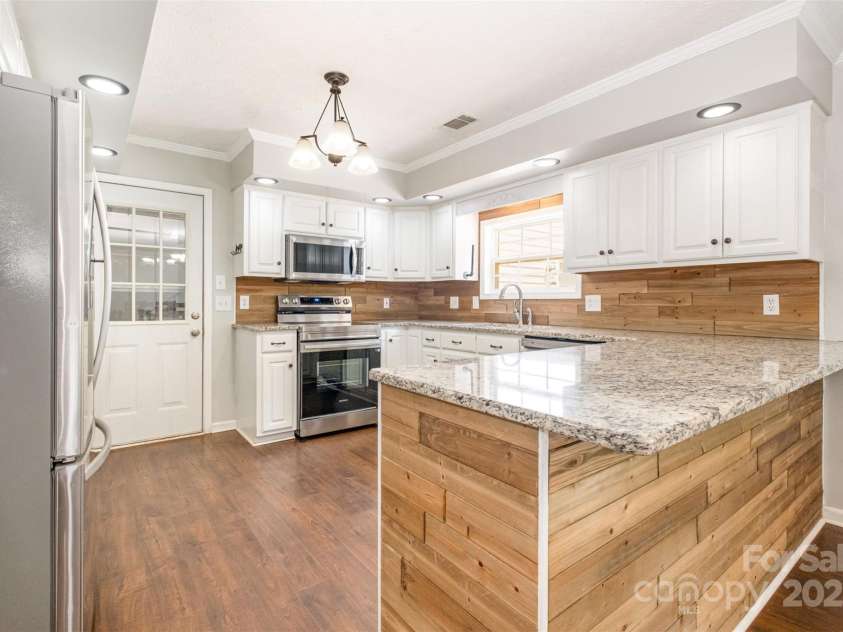 6811 Kluttz Road, Concord, NC 28025.  MLS# CAR4272402, YatesRealty ID 23387. Kitchen