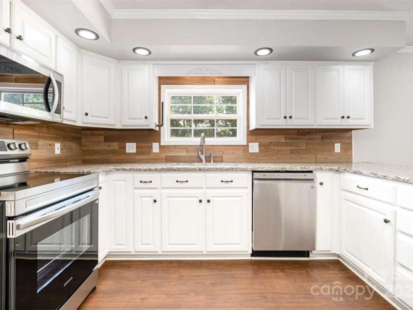 6811 Kluttz Road, Concord, NC 28025.  MLS# CAR4272402, YatesRealty ID 23387. Kitchen