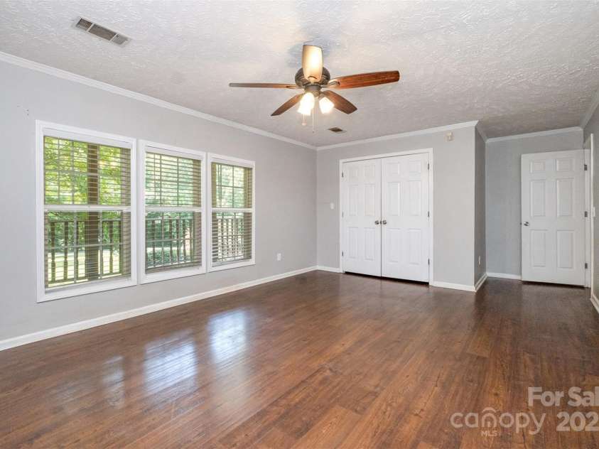 6811 Kluttz Road, Concord, NC 28025.  MLS# CAR4272402, YatesRealty ID 23387. Primary Bedroom (main level)