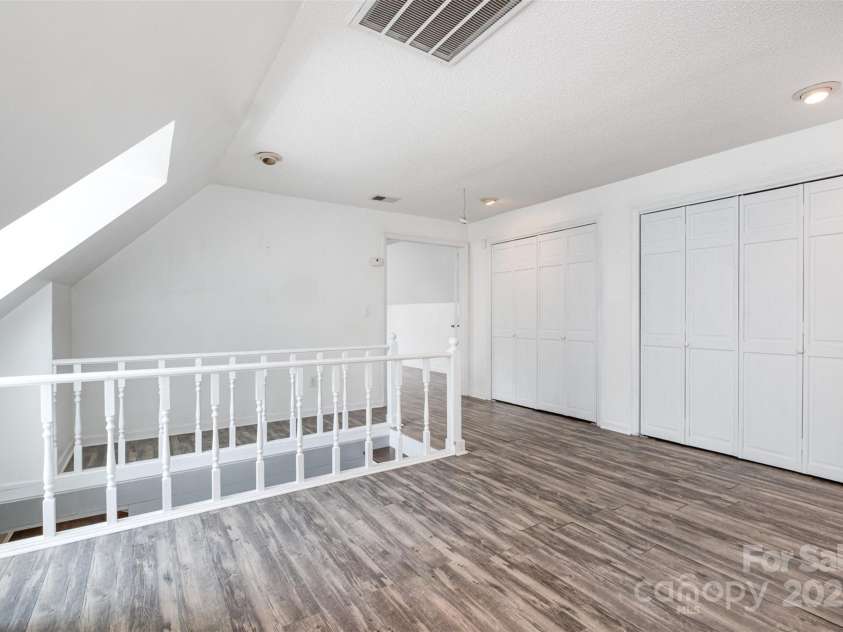 6811 Kluttz Road, Concord, NC 28025.  MLS# CAR4272402, YatesRealty ID 23387. Upstairs Loft